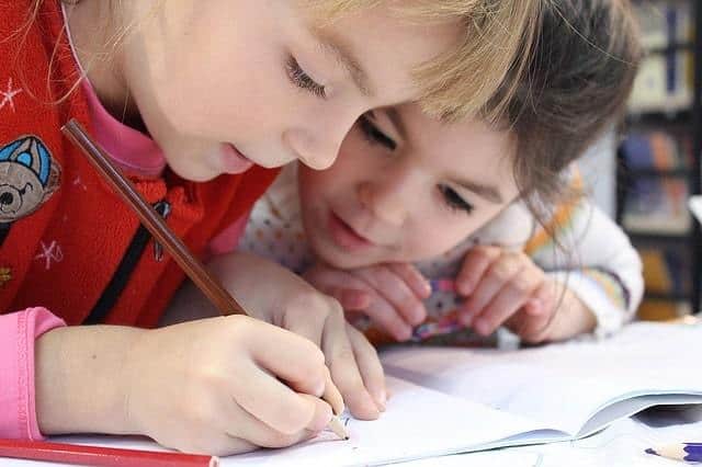 2 Kids Learning Together