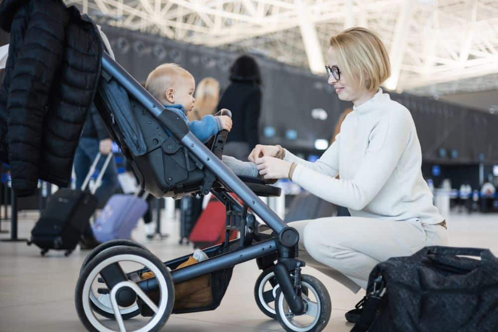 Stroller overhead outlet bin